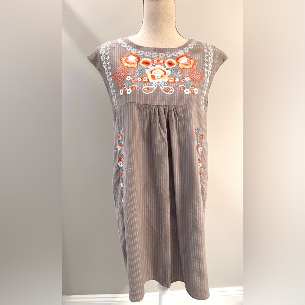 Pin striped embroidered shift dress.